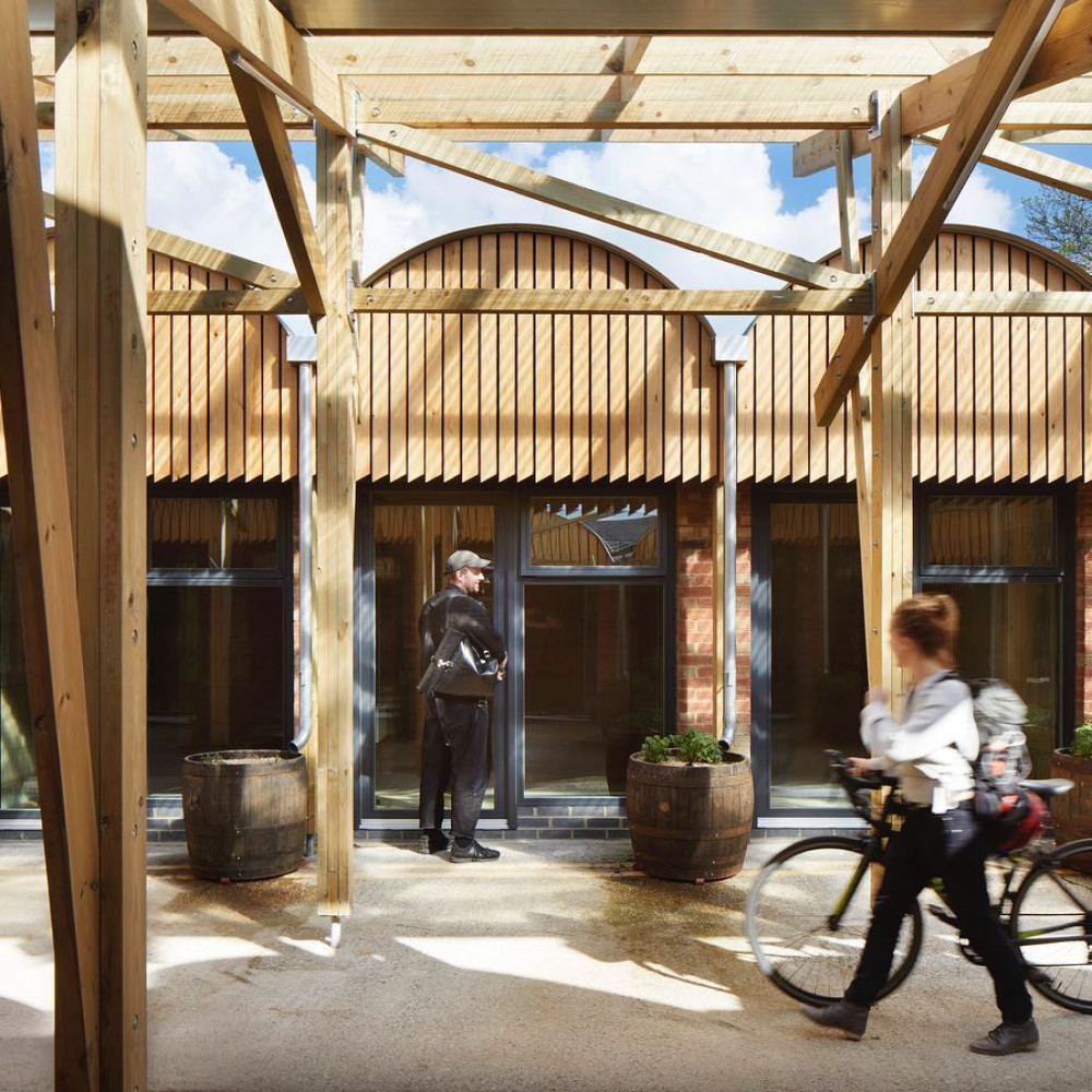 Great to see our Angel Yard project with @jankatteinarch shortlisted in 2 categories for this years Structural Timber Awards.  It was certainly a labour of love, finding practical ways to reuse the tired old garage structures on the site, combined with elegant and efficient timber additions to create new work and meeting spaces for the community, so we are very pleased that the project is getting the recognition that it deserves. 
📸 @jackhobhouse 
#retrofit #repurposed #repurposedbuildings #timber #timberconstruction #timberbuildings #community